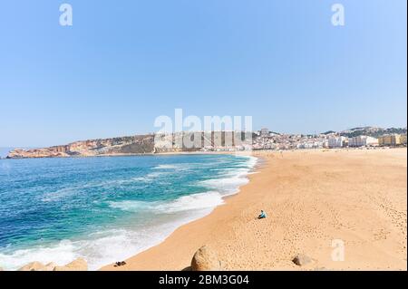 Summer morning at beach of Nazaré in Portugal Stock Photo