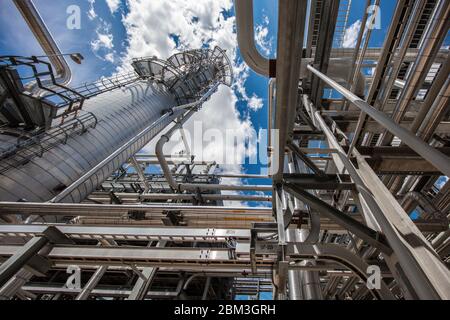 Natural gas processing plant structures with blue sky Stock Photo