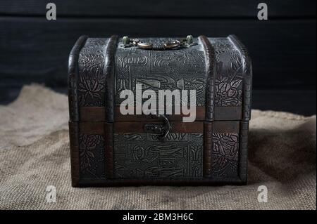 old wooden decorative chest on a black background still life Stock Photo