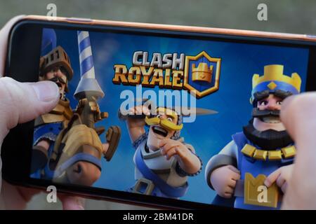New York, USA - 1 May 2020: Clash Royale mobile game app logo close-up on phone screen, Illustrative Editorial Stock Photo