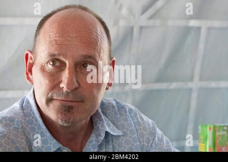 Austin, Texas USA, October 2011: Children's book author Jon Scieszka, waits to autograph books in the author book-signing tent at the Texas Book Festival. ©Marjorie Kamys Cotera/Daemmrich Photography Stock Photo