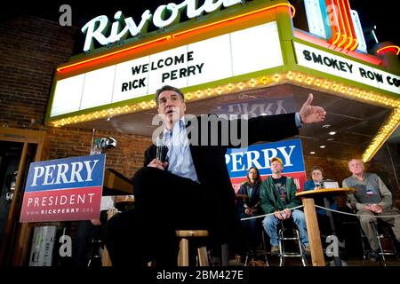 Oskaloosa, Iowa USA, December 26, 2011: Texas Gov. Rick Perry, a candidate for the Republican presidential nomination, makes a final push with Iowa caucus voters during a town hall meeting at the Smokey Row Coffee Shop. Perry is hoping to revive his campaign after steadily falling in most polls since several gaffes derailed his efforts to remain a top contender in the Republican primary. ©Bob Daemmrich Stock Photo
