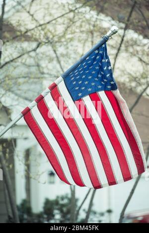 American flag on house porch Stock Photo