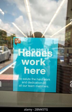 Sign in Walgreen's Pharmacy window honoring their workers as heroes  during Covid 19 pandemic in North Central Florida. Stock Photo