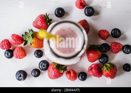 Strawberry, raspberry, blueberry and blackberry on white background Stock Photo