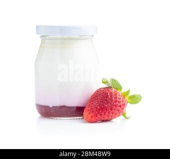 White fruity yogurt in jar and strawberries isolated on white background. Stock Photo