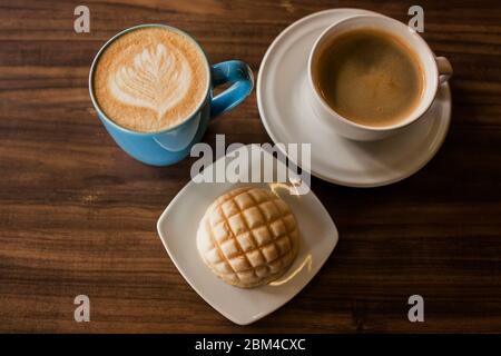 https://l450v.alamy.com/450v/2bm4cxc/coffee-cup-and-concha-mexican-bread-for-a-breakfast-in-mexico-city-top-view-2bm4cxc.jpg