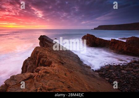 Rock formations on the beach in Widemouth Bay, Cornwall, UK. Stock Photo