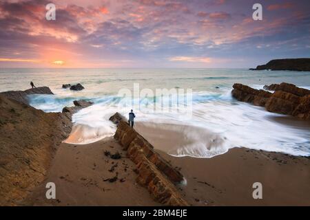 Rock formations on the beach in Widemouth Bay, Cornwall, UK. Stock Photo