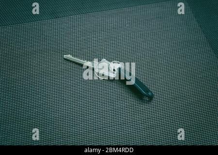 The key with a tag from the hotel room on the table Stock Photo