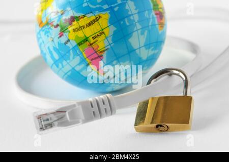 Internet cable with padlock and earth planet on white background - Concept of internet security and network protection Stock Photo