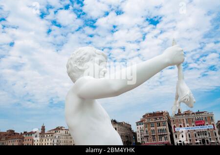 Boy with Frog. Statue by Charles Ray at Punta della Dogana at art exhibit of biennale, venice, veneto, italy Stock Photo