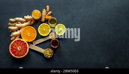 Healthy ingredients for boosting immunity - ginger, turmeric, citruses, and honey Stock Photo