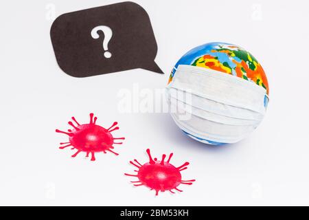 globe in medical mask near speech bubble with question mark and drawn virus on white Stock Photo