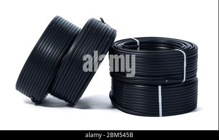 Coils of black cable isolated on white background Stock Photo