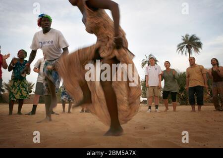 The 'Kunte Kinte High School Dance group' perform at the Gunjar residential project, Gambia.  Jenny Ringstead opened the Gunjur residential project, in Jan. 2007 in Gunjar, Gambia. Stock Photo