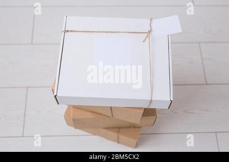 Many boxes with space for advertisement delivered from online store. Internet shopping and delivery concept. Stock Photo