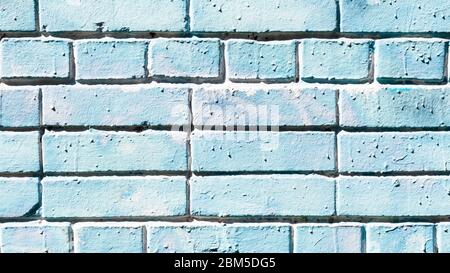 panoramic construction background - outdoor wall of house from blue colored bricks Stock Photo