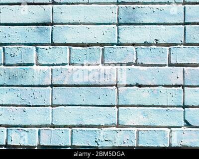 construction background - outdoor wall of house from blue painted bricks Stock Photo