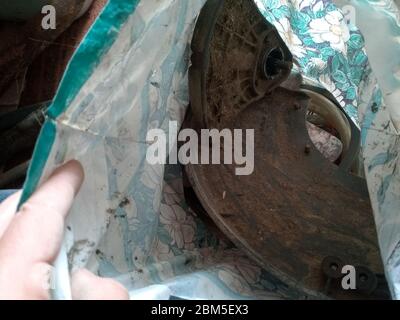 Parts from broken motos. Petrol trimmer disassembled. Stock Photo