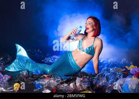 Ocean pollution, rubbish in the water. Stupid fairytale mermaid in dirty  ocean. Plastic trash and garbage in water. Environmental problem, plastic  bag Stock Photo - Alamy