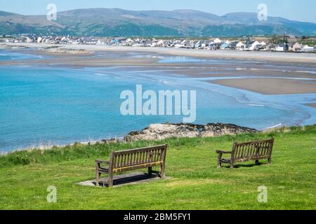 Borth,Beach,holiday,seaside,resort,north,of,Aberystwyth,Ceredigion,on,a,sunny,May,day,at,low,tide,Ceredigion,West,Mid,Wales,Welsh,UK,United Kingdom. coast,coastal,Empty,beach,seaside,due,to,lockdown,during,Coronavirus,Covid 19,pandemic,virus,outbreak,and,government,restrictions,to,stay home.Currently Wales is closed to English tourists,but in near future will become a popular destination for a holiday at home,staycation. Stock Photo