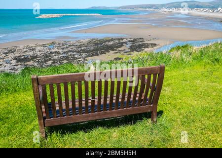 Borth,Beach,holiday,seaside,resort,north,of,Aberystwyth,Ceredigion,on,a,sunny,May,day,at,low,tide,Ceredigion,West,Mid,Wales,Welsh,UK,United Kingdom. coast,coastal,Empty,beach,seaside,due,to,lockdown,during,Coronavirus,Covid 19,pandemic,virus,outbreak,and,government,restrictions,to,stay home.Currently Wales is closed to English tourists,but in near future will become a popular destination for a holiday at home,staycation. Stock Photo