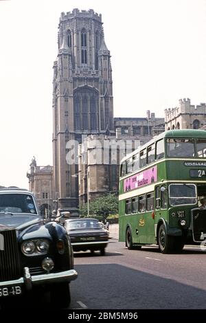 Bristol in the 60s and 70s:  Bristol University’s Wills Memorial Building in June 1970 with the city’s Museum and Art Gallery in the background.  In the foreground heading along Park Row is a Bristol Omnibus KSW type bus, which was standard for the city’s bus company during the 1950s and 60s but would have been reaching the end of its working life in the early 70s.  It entered service in 1955 and had a 6-cylinder Bristol diesel engine with four speed manual gearbox, giving a top speed of 31 m.p.h.  There were 60 seats.  This one was on the 2A route from Shirehampton to Lockleaze and would have Stock Photo