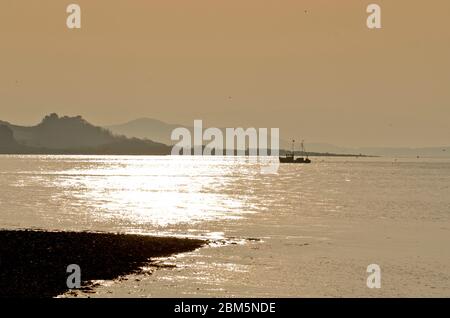 ayrshire coast sunset by largs Stock Photo