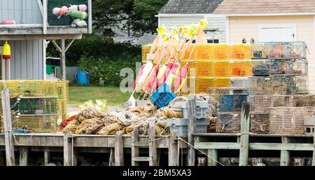 Equipment for fishing and catching lobsters on a pier in maine. Stock Photo