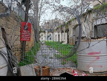 14 Feb 2020 - Nicosia, Cyprus: Barbed wire and obstacles in the border zone 'Green Line' in Nicosia, Cyprus Stock Photo
