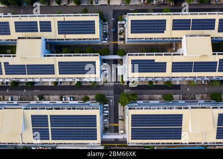 Solar panels installed on industrial factories rooftop. Singapore. Stock Photo