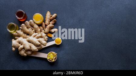 Healthy ingredients for boosting immunity - ginger, honey, and turmeric Stock Photo