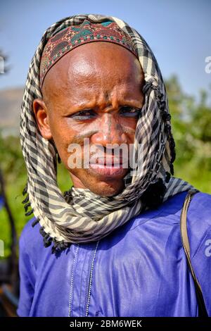 Portrait of a fulani man with facial tattoos. Stock Photo