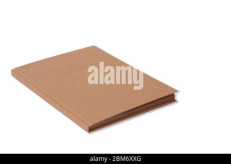 Sketchbook with a hard cardboard cover on white background. Close-up. Mock up stock photo, side view. Selective focus, portret format. Brown Kraft Stock Photo