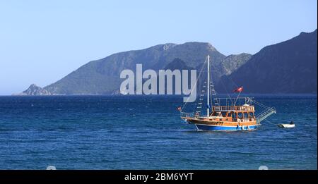 tourist boat with turkish flags float on sea Stock Photo