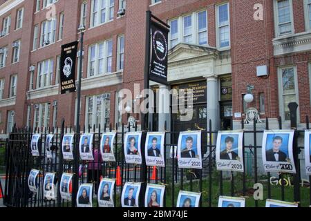 May 7, 2020, New York, New York, USA: Covid19  N.Y.C. 5/7/2020 Madison High School in the Midwood section of Brooklyn hangs over 800 photographs of their seniors because they had to cancel the Graduation ceremony due to the Corona Virus Pandemic the school principal wanted to honor the students for there hard work.Front of James Madison High School where Supreme Court Justice Ruth Bader Ginsberg graduated (Credit Image: © Bruce Cotler/ZUMA Wire) Stock Photo