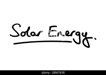 Solar Energy handwritten on a white background. Stock Photo