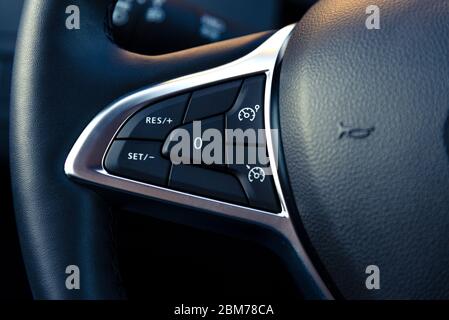 control buttons on the steering wheel of a modern car Stock Photo