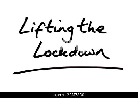 Lifting the Lockdown handwritten on a white background. Stock Photo