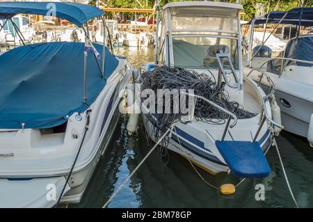 Fishing boats parked in parallel Stock Photo