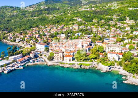 Croatia, beautiful town of Lovran and Lungomare sea walkway, aerial panoramic view in Kvarner bay coastline Stock Photo