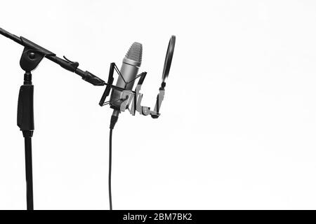 Studio Condenser Mic On Stand In Sound Studio Isolated On White Background Stock Photo