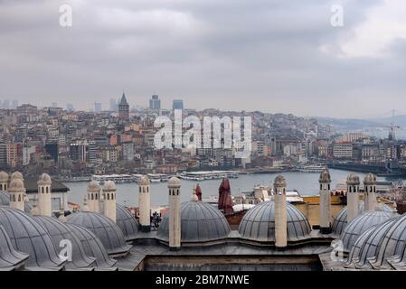 February 22, 2018: View over Istanbul through the domes and chimneys of the Suleymaniye Complex. Istanbul, Turkey Stock Photo
