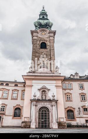 Feb 4, 2020 - Salzburg, Austria: Front facade of Abbey church with onion dome inside St Peter Abbey Stock Photo