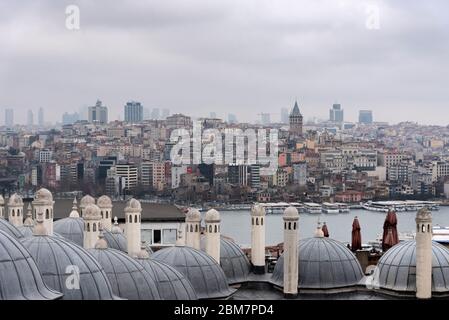 February 22, 2018: View over Istanbul through the domes and chimneys of the Suleymaniye Complex. Istanbul, Turkey Stock Photo