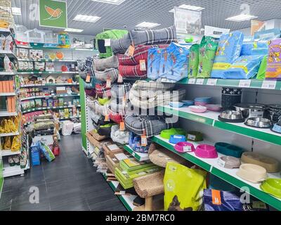 Moscow, Russia,1 may, 2020. pet food product on shelves.Food department for dogs and cats. Shelving with various types of items for pets inside Stock Photo