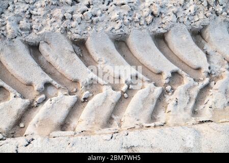 big car tires on the sand, track closeup Stock Photo