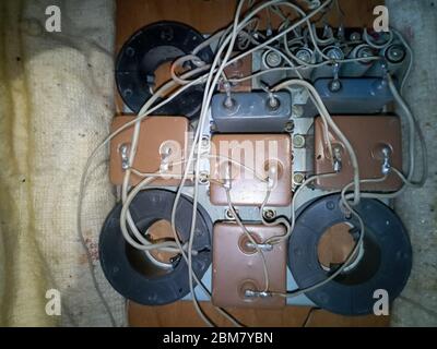 Acoustic filter - crossover, Amphiton 35AC-018 vintage acoustic system. Capacitors and coils on the circuit board. Stock Photo