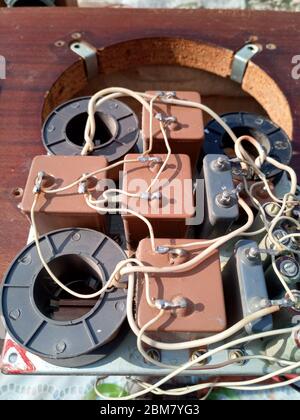 Acoustic filter - crossover, Amphiton 35AC-018 vintage acoustic system. Capacitors and coils on the circuit board. Stock Photo